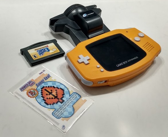 The E-Reader plugged into a Game Boy Advance